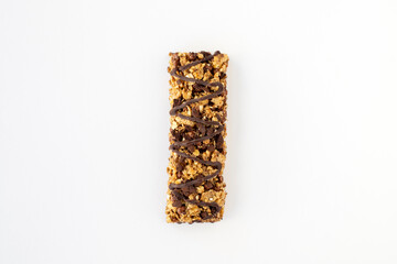 Chocolate granola bar isolated on white background. Healthy sweet dessert snack. 