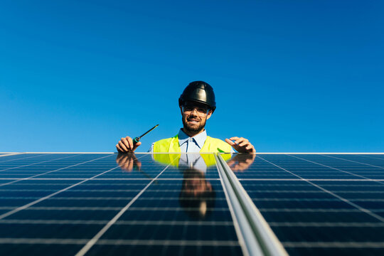 Solar panel installer at work