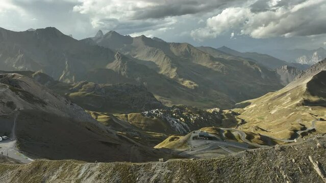 Col du lautaret aerial view during sunset french alps winding road in mountains