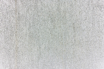 Lightly painted plaster surface texture background close up