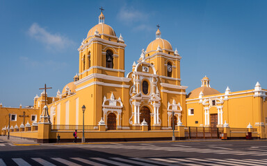 The grand cathedral with its bright yellow shade and white ornaments, Trujillo, Peru - obrazy, fototapety, plakaty
