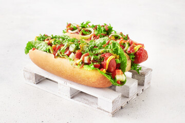 Fresh made hot dogs with ketchup, mustard and salad