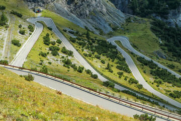 The detail of the hairpins of the challenging road towards the famous Stelvio Pass in the italian...