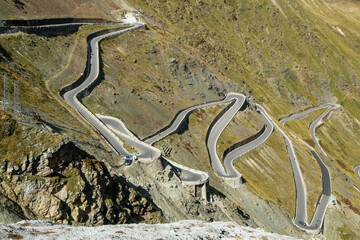The detail of the hairpins of the challenging road towards the famous Stelvio Pass in the italian Alps, close to Switzerland. 
