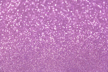 Glitter sparkling purple bokeh background