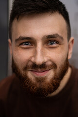 Obraz premium Young handsome man with a red beard, portrait, close-up.