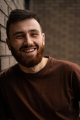 Obraz premium Young handsome man with a red beard, portrait, close-up.