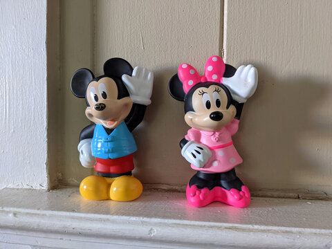 Mickey Mouse and Minnie Mouse plastic figures