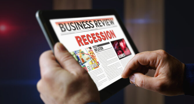 Recession and business crisis newspaper on mobile tablet screen