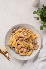 Pasta with chicken and cream mushroom sauce