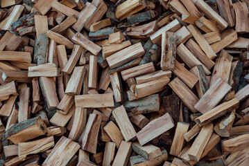 Part of the decoration of the facade of the building and the material from which it is built; 
chopped firewood and piled in a disorderly manner