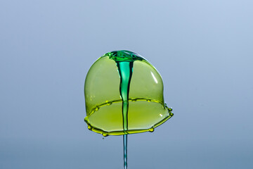 Water drop falling and colliding with another one