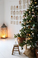 Christmas tree with toys and advent calendar and December mood