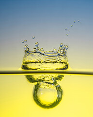 Water drop falling and colliding with another one