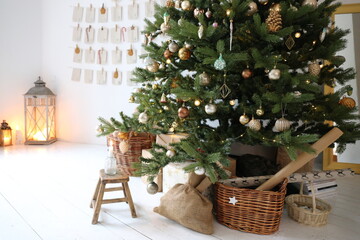 Christmas tree with toys and advent calendar and December mood