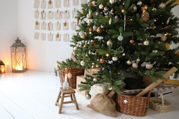 Christmas tree with toys and advent calendar and December mood