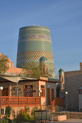 Minaret Kalta-Minar with oriental pattern overlooking the central square in the old city of Khiva in Uzbekistan