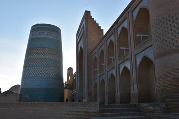 Minaret Kalta-Minar in the old city of Khiva at sunset in Uzbekistan