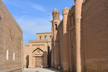 Old streets in oriental style of Khiva city in Uzbekistan with minarets, towers and mosques