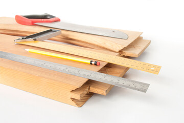 carpentry tools and studded wooden blanks for assembling doors, on a white background