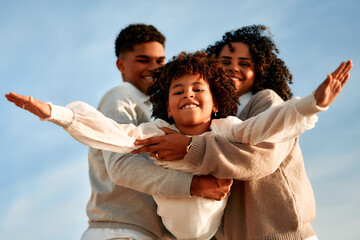 African American family on the beach on the weekend