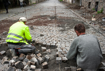 The new city lane is paved with cobblestones.