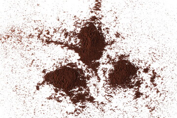 Coffee powder pile isolated on white, top view