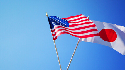 Japanese and American flags. International cooperation. 