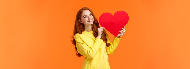 Valentines day perfect time to confess. Cute romantic and tender redhead woman in yellow sweater...