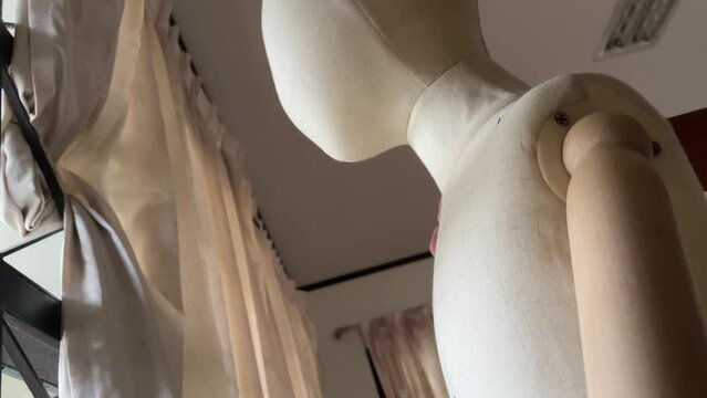 Creepy male hand touching and groping child mannequin body. Child abuse concept. Young children victim of domestic violence.