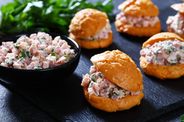 ham salad sandwiched between gougeres, top view