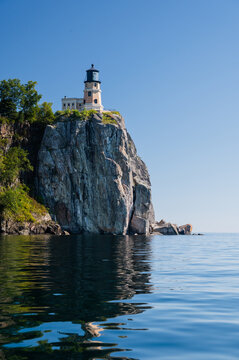 lighthouse above cliff 