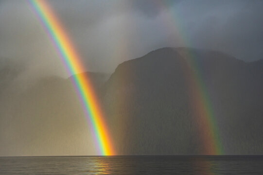 A double rainbow over a fjord in the Great Bear Rainforest of British Columbia.
