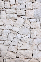 Realistic stone background. The natural texture of stone. Granite wall background, concrete texture. Stone mosaic.
