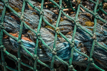 detail of a weathered fishing net