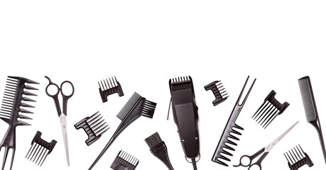 Professional hair clipper with set of nozzles of different sizes isolated on white background,...