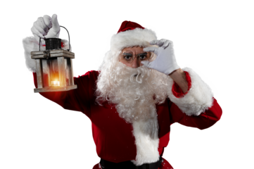 Doubtful  santa claus with a vintage lantern