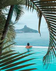 man in a paradisiac luxury beach