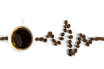 Cardiogram from coffee beans. White background.