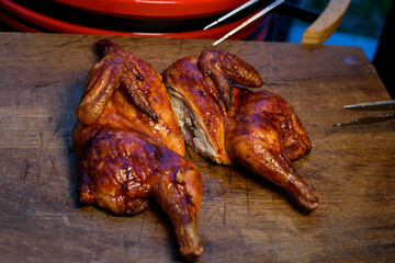 Barbeque cooked whole chicken. BBQ chicken. Whole cooked chicken.
