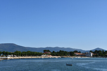 Fototapeta na wymiar boat on the lake, photo as a background, photo as a background , in finisterre north spain, galicia, spain, europe