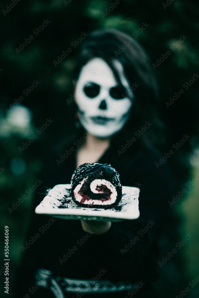 Wall mural Serbian woman wearing a skeleton face during Halloween