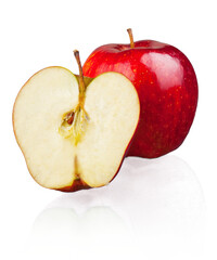 Fresh red apple and half isolated on white background