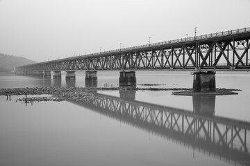The Qiantang River Bridge in the fog.