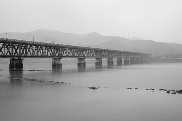 The Qiantang River Bridge in the fog.