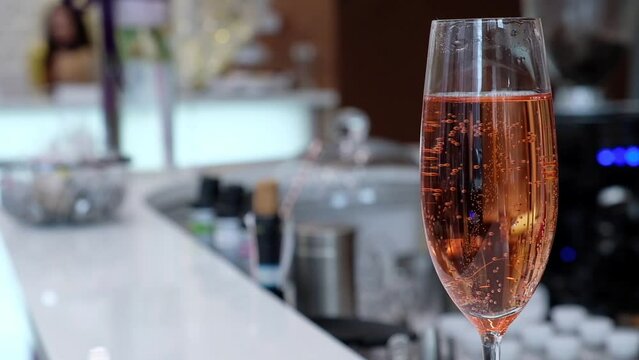a glass of sparkling wine at an event close-up