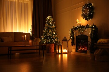 Obraz premium Beautiful room interior with fireplace and Christmas decor in evening