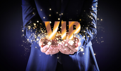 VIP member. Closeup view of man showing virtual abbreviation on dark background