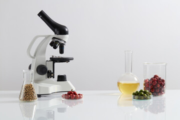 Experiment and development of products from fresh coffee in the laboratory with microscope. Coffee extract experiment content