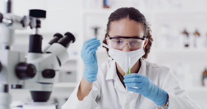 Scientist, mask and pipette test tube for plant research, testing and experiment. Food science, gmo and botanist in laboratory analyzing leaf samples to optimize growth or food farming and production